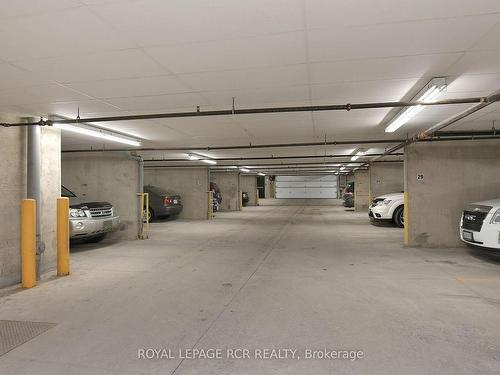 406-200 Broadway, Orangeville, ON - Indoor Photo Showing Garage