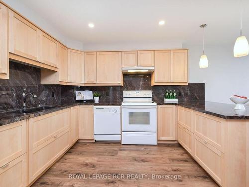 406-200 Broadway, Orangeville, ON - Indoor Photo Showing Kitchen With Double Sink