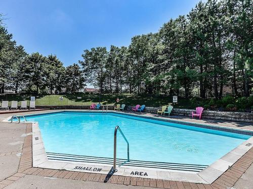 1512-20 Cherrytree Dr, Brampton, ON - Outdoor With In Ground Pool With Backyard