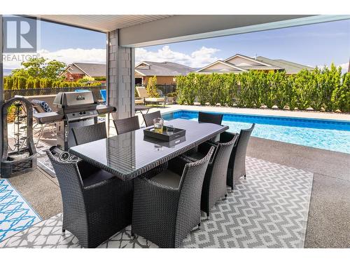 682 Peridot Court, Kelowna, BC - Outdoor With In Ground Pool With Deck Patio Veranda With Exterior