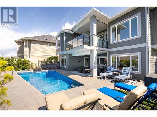 682 Peridot Court, Kelowna, BC - Outdoor With In Ground Pool With Exterior