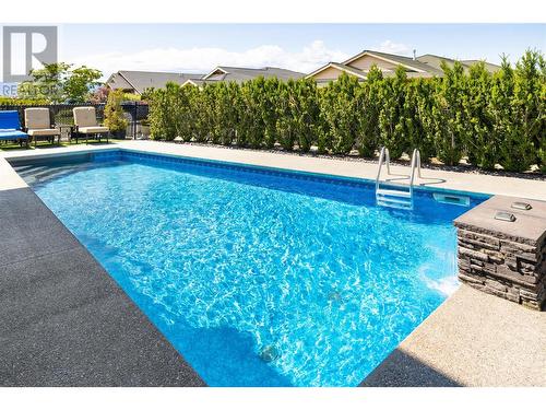 682 Peridot Court, Kelowna, BC - Outdoor With In Ground Pool With Backyard