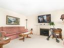 166-1255 Raymer Avenue, Kelowna, BC  - Indoor Photo Showing Living Room With Fireplace 