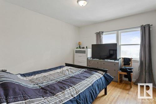 9244 Jasper Av Nw, Edmonton, AB - Indoor Photo Showing Bedroom