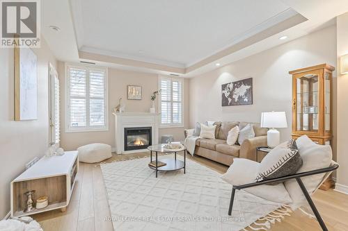 116 - 3351 Cawthra Road, Mississauga, ON - Indoor Photo Showing Living Room With Fireplace