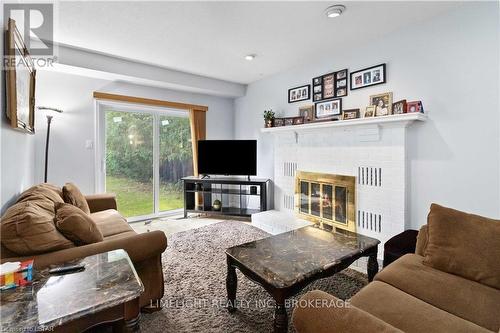 66 Nanette Drive, London, ON - Indoor Photo Showing Living Room With Fireplace