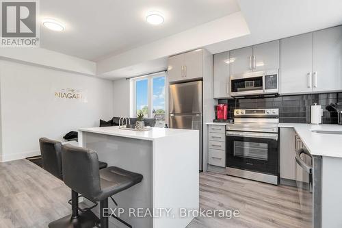 312 - 6065 Mcleod Road N, Niagara Falls, ON - Indoor Photo Showing Kitchen With Upgraded Kitchen