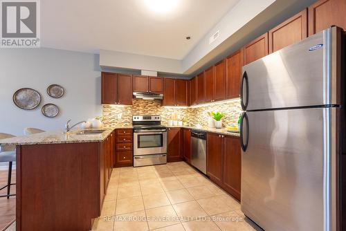 #202 -50 Mill St N, Port Hope, ON - Indoor Photo Showing Kitchen With Upgraded Kitchen