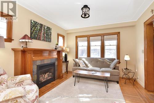 3 Mountain Ave, Hamilton, ON - Indoor Photo Showing Living Room With Fireplace
