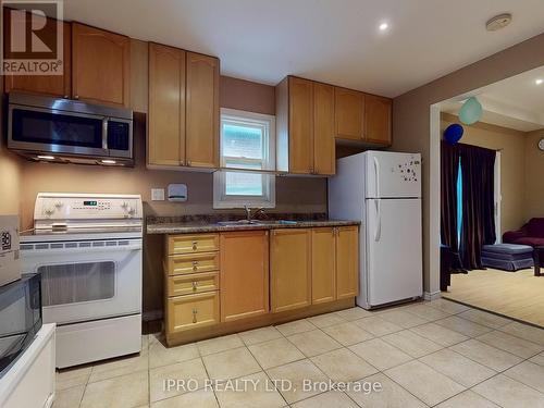 4 Mcmurchy Ave S, Brampton, ON - Indoor Photo Showing Kitchen With Double Sink