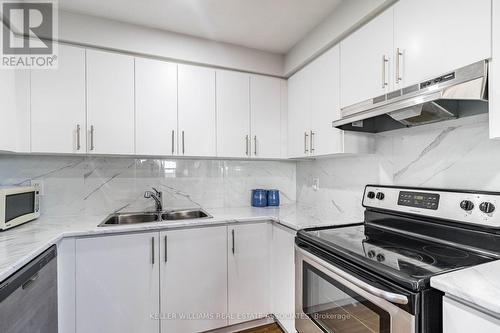 #115 -3040 Constitution Blvd, Mississauga, ON - Indoor Photo Showing Kitchen With Stainless Steel Kitchen With Double Sink