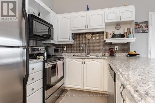 #410 -4025 Kilmer Dr, Burlington, ON - Indoor Photo Showing Kitchen With Upgraded Kitchen