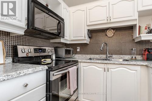 #410 -4025 Kilmer Dr, Burlington, ON - Indoor Photo Showing Kitchen With Upgraded Kitchen