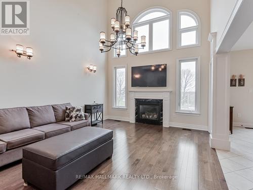 25 Keenan Dr, Adjala-Tosorontio, ON - Indoor Photo Showing Living Room With Fireplace