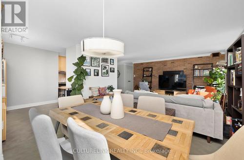 #1608 -25 Maitland Ave, Toronto, ON - Indoor Photo Showing Dining Room With Fireplace