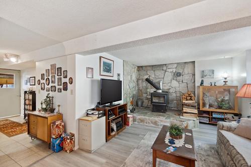 1176 Marshall Road, Castlegar, BC - Indoor Photo Showing Living Room With Fireplace