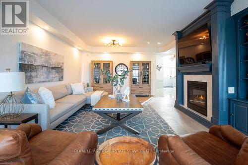 #17 -88 Lakeport Rd, St. Catharines, ON - Indoor Photo Showing Living Room With Fireplace