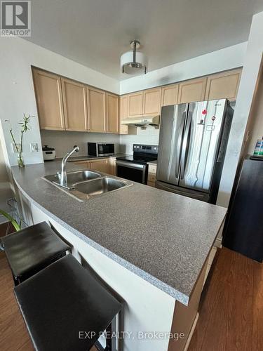 #405 -60 Brian Harrison Way, Toronto, ON - Indoor Photo Showing Kitchen With Double Sink
