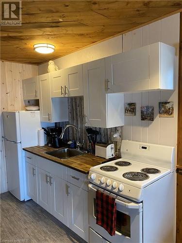 665 Pt Chimo Island Unit# 2, Temagami, ON - Indoor Photo Showing Kitchen With Double Sink