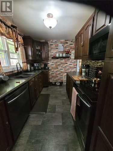 7 Coronation Street, Corner Brook, NL - Indoor Photo Showing Kitchen With Double Sink