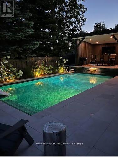 97 Gardiner Dr, Bradford West Gwillimbury, ON - Outdoor With In Ground Pool With Backyard
