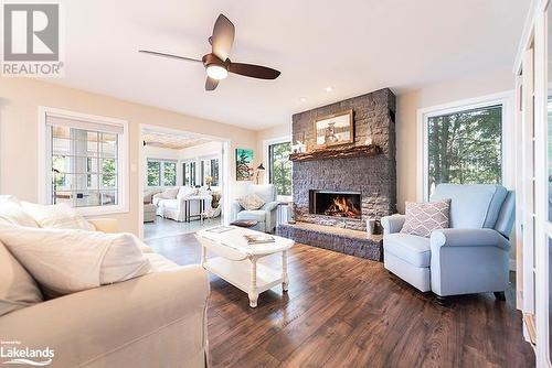 340 Healey Lake, Archipelago South, ON - Indoor Photo Showing Living Room With Fireplace