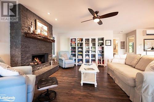 340 Healey Lake, Archipelago South, ON - Indoor Photo Showing Living Room With Fireplace