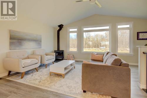 4507 Wilmer Rd, South Frontenac, ON - Indoor Photo Showing Living Room With Fireplace