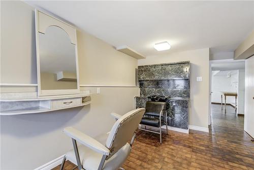 Lower Level Workshop with Separate Entrance - 111 Glen Castle Drive, Hamilton, ON - Indoor With Fireplace