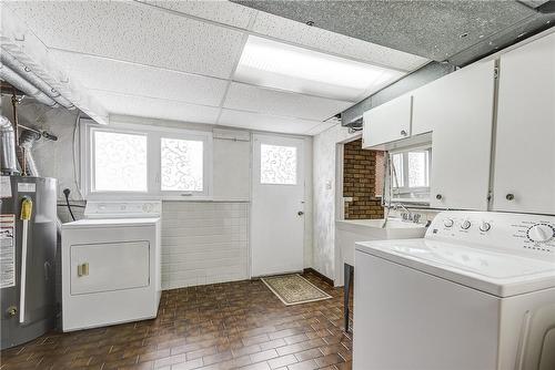 Lower Level Laundry with Inside Access - 111 Glen Castle Drive, Hamilton, ON - Indoor Photo Showing Laundry Room