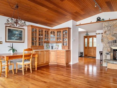 1695 Wall Beach Rd, Nanoose Bay, BC - Indoor Photo Showing Dining Room With Fireplace