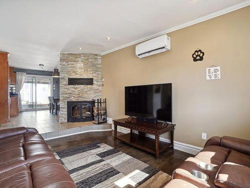 Overall view - 33 65E Avenue, Saint-Eustache, QC - Indoor Photo Showing Living Room With Fireplace