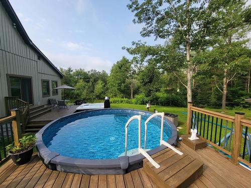 Pool - 566 Ch. De L'Île-Aux-Chats, Lachute, QC - Outdoor With Above Ground Pool With Deck Patio Veranda With Backyard With Exterior