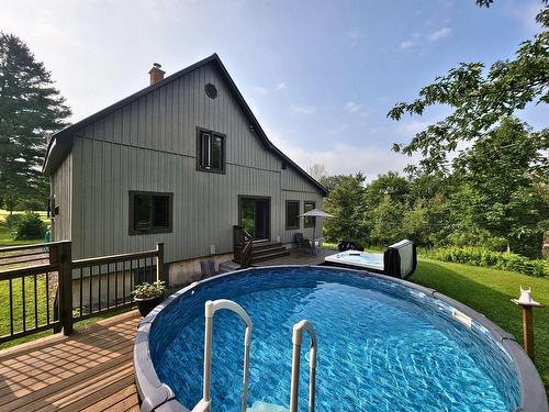 Pool - 566 Ch. De L'Île-Aux-Chats, Lachute, QC - Outdoor With Above Ground Pool With Exterior