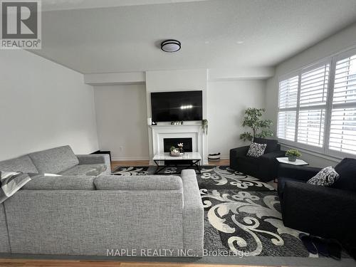 420 Black Cherry Cres, Shelburne, ON - Indoor Photo Showing Living Room With Fireplace