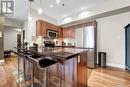 208 721 8Th Street E, Saskatoon, SK  - Indoor Photo Showing Kitchen With Stainless Steel Kitchen With Upgraded Kitchen 