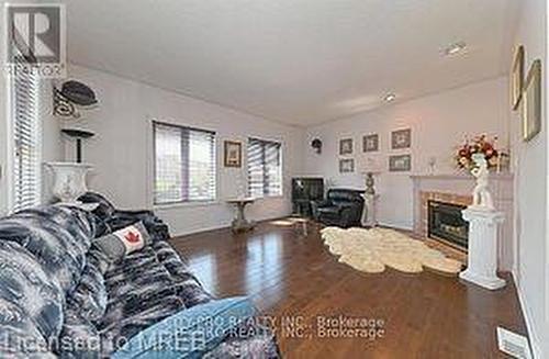 5121 Parkplace Circle, Mississauga, ON - Indoor Photo Showing Living Room With Fireplace