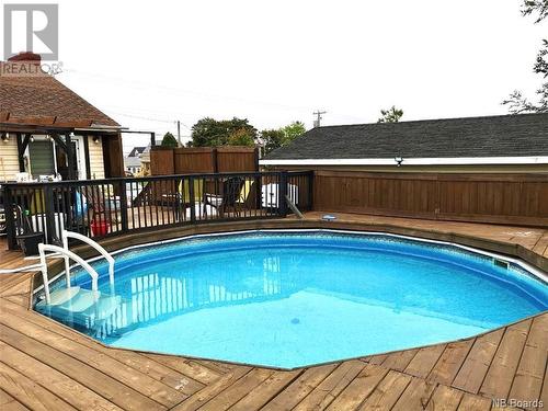 372 St-Pierre E. Boulevard, Caraquet, NB - Outdoor With Above Ground Pool With Deck Patio Veranda With Backyard
