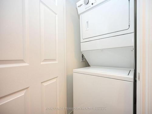 605-716 Main St E, Milton, ON - Indoor Photo Showing Laundry Room