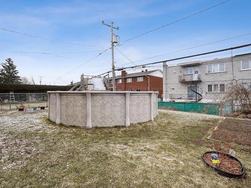 Backyard - 5070 Boul. Samson, Laval (Chomedey), QC - Outdoor With Above Ground Pool