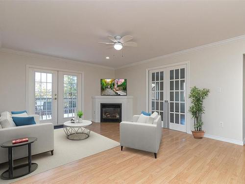 4040 Holland Ave, Saanich, BC - Indoor Photo Showing Living Room With Fireplace