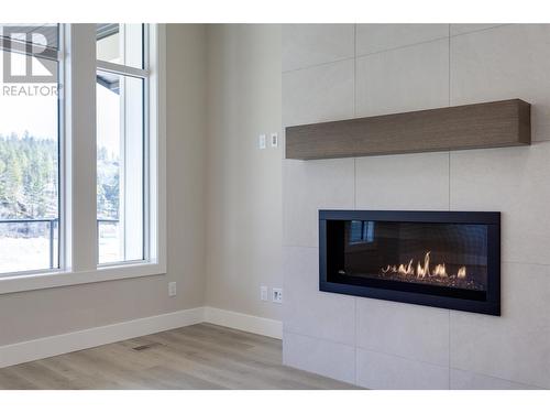 3438 Hilltown Close, Kelowna, BC - Indoor With Fireplace