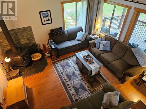 153 Wildwood Road, Nakusp, BC - Indoor Photo Showing Living Room With Fireplace