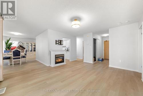 #116 -8 Talbot St, Prince Edward County, ON - Indoor With Fireplace