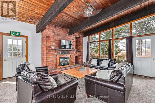 141 Kandahar Lane, Blue Mountains, ON - Indoor Photo Showing Living Room With Fireplace