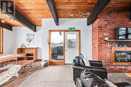 141 Kandahar Lane, Blue Mountains, ON - Indoor Photo Showing Living Room With Fireplace