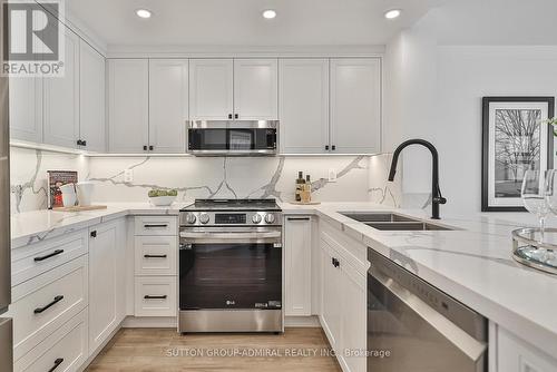 #1106 -7440 Bathurst St, Vaughan, ON - Indoor Photo Showing Kitchen With Double Sink With Upgraded Kitchen