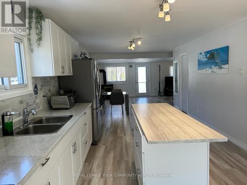 56 60Th St S, Wasaga Beach, ON - Indoor Photo Showing Kitchen With Double Sink