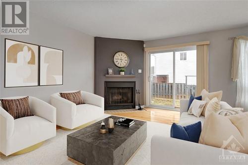 Virtually Staged - 985 Karsh Drive, Ottawa, ON - Indoor Photo Showing Living Room With Fireplace
