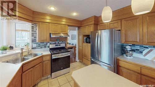 4219 Wascana Ridge, Regina, SK - Indoor Photo Showing Kitchen With Double Sink